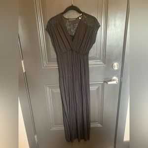 Black dress with lace detail on back,size medium, with tags, never worn!